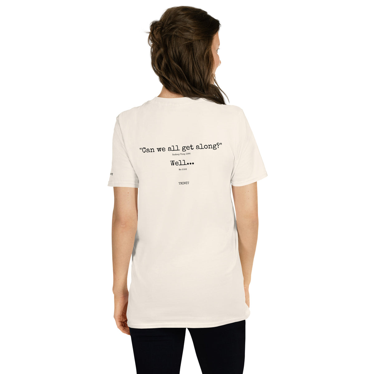 Rear view of a model wearing the Natural T-shirt, showing the statement printed on the back.